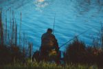 man fishing from the shore